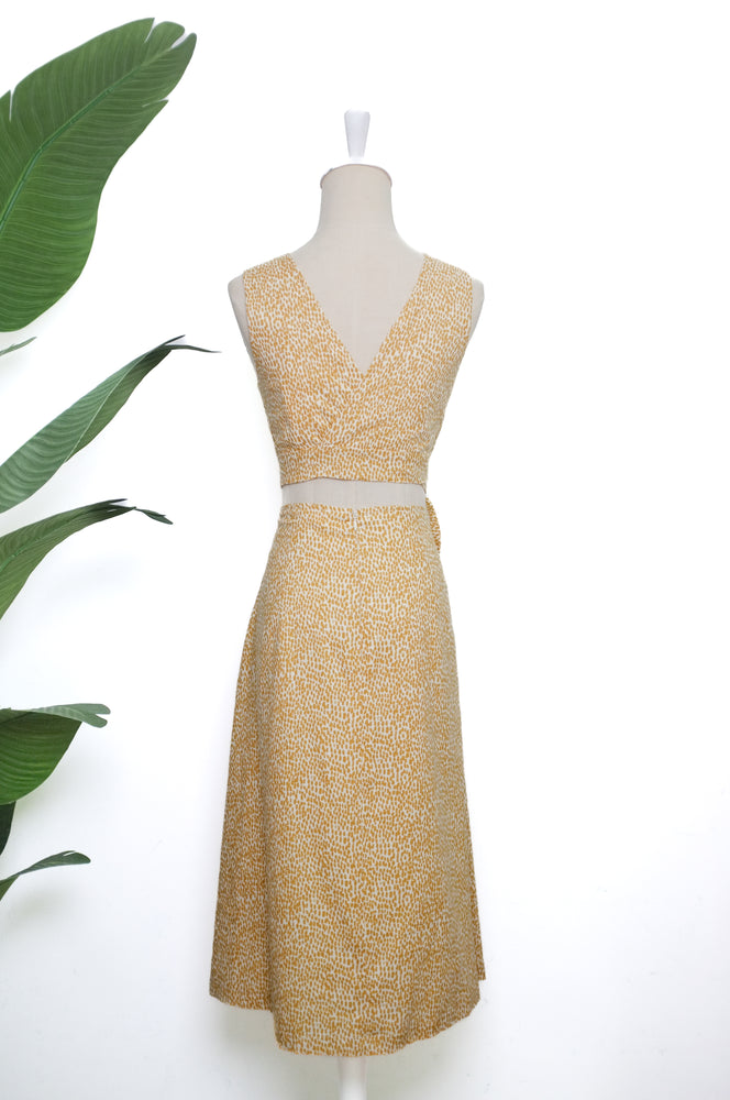 
            
                Load image into Gallery viewer, Etta Wrap Midi Dress - Golden Drops
            
        