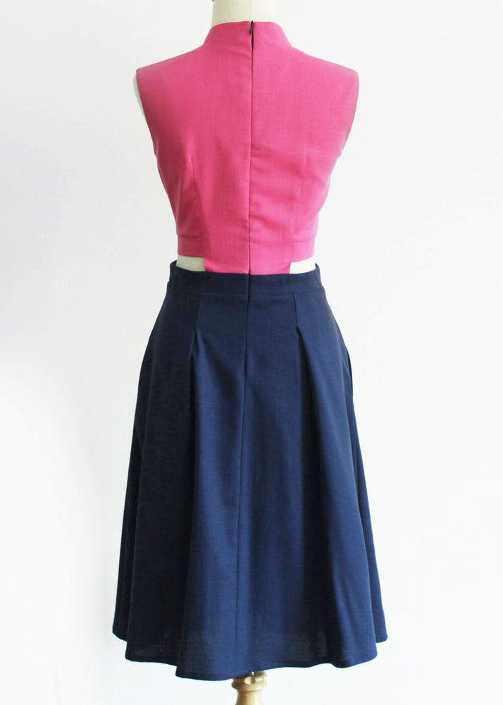 
            
                Load image into Gallery viewer, Signature Bi-Colour Cut-Out Cheongsam-  Pink/Navy (Pre-order)
            
        