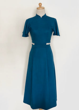 
            
                Load image into Gallery viewer, Signature Cut-Out Cheongsam with Sleeves - Fall Blue (Pre-order)
            
        